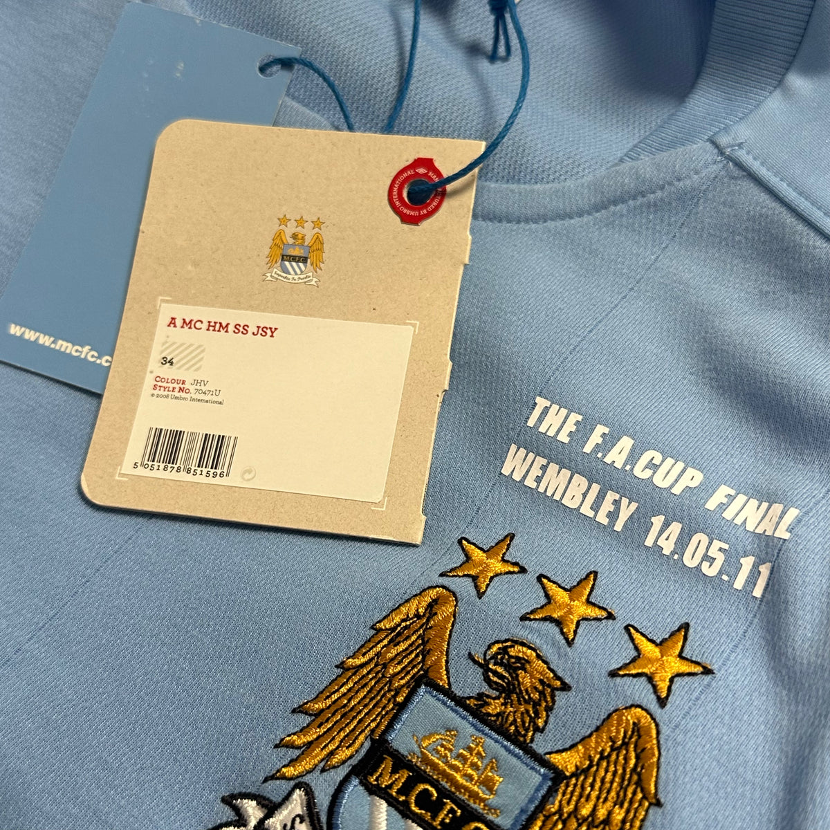 2010-11 Manchester City Home Shirt Yaya Toure 42 FA Cup [Excellent] — Looking after your Manchester City Home jersey | The Vault